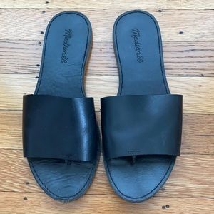 Madewell Black slip on sandals.